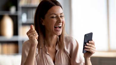 Woman Excited Winning a Prize on her phone