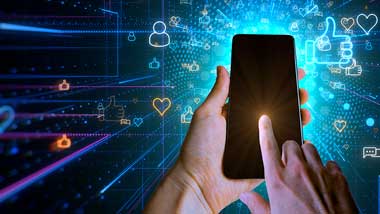 Hand Holding Phone with Abstract Social Media icons